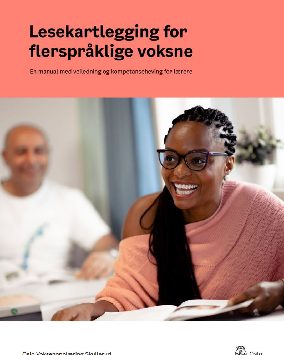 en person som smiler til kameraet