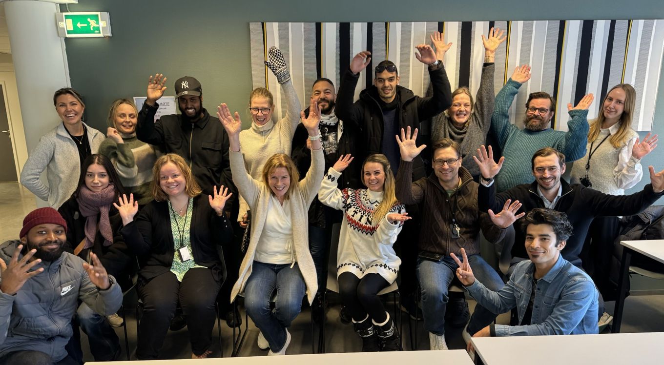 Foto: Paul Sunde En gruppe mennesker som poserer for et bilde