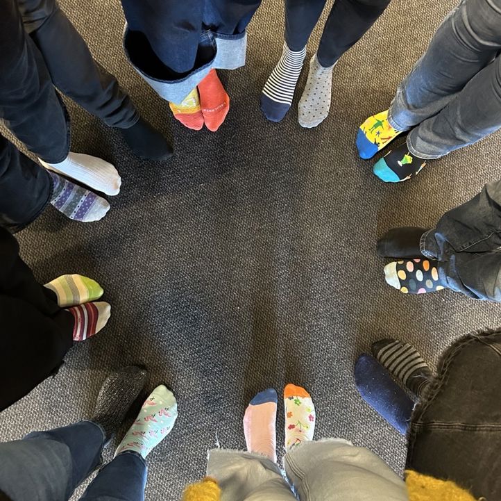 a group of people's feet a group of people's feet